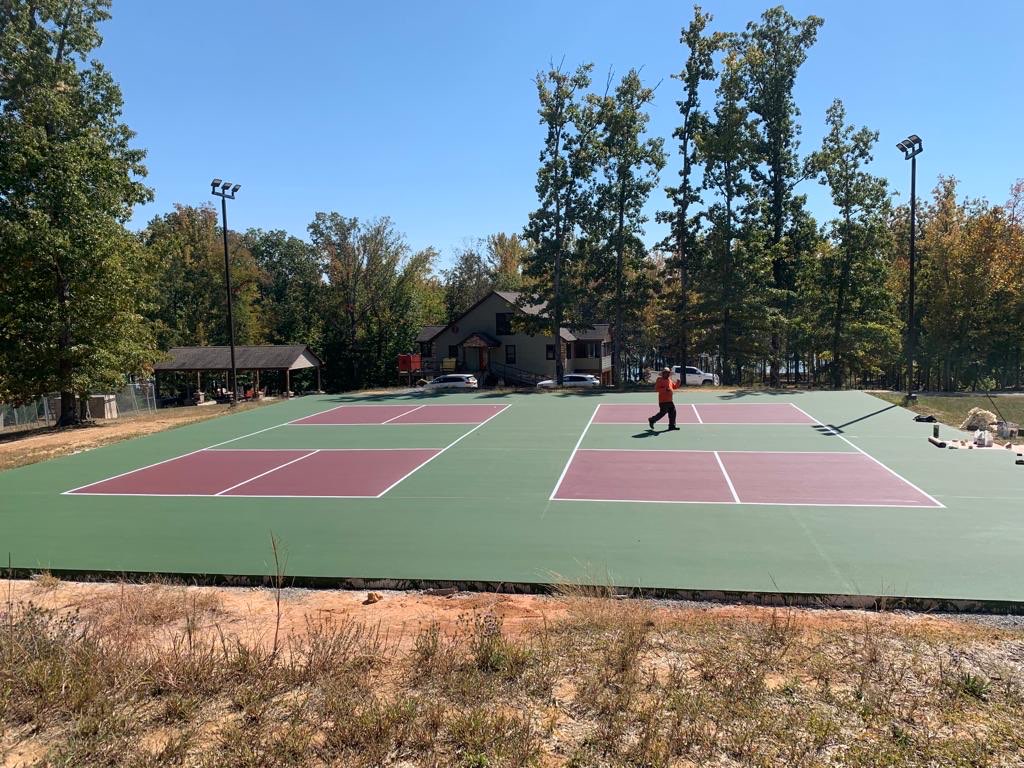 Four pickleball courts finished in maroon and green